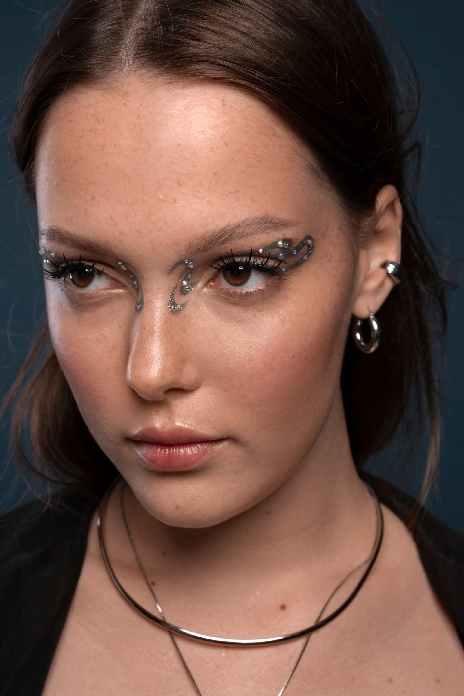 portrait woman wearing jewelry makeup (1) (1)